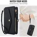 Black leather phone wallet case with side zipper coin purse showing wristlet strap attachment held on a woman's wrist.