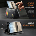 Black leather wallet case for iPhone DUO set up in hands-free kickstand position showing 110-degree to 160-degree adjustable viewing angles and rear card slots.