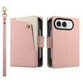 Blush pink dual-tone leather wallet case for iPhone DUO showcasing the front cover with a cream snap card pocket, camera cutout, and matching wristlet strap.
