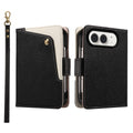 Classic black dual-tone leather wallet case for iPhone DUO displaying the front cover with a cream snap button pocket, precise camera cutout, and matching wrist strap.