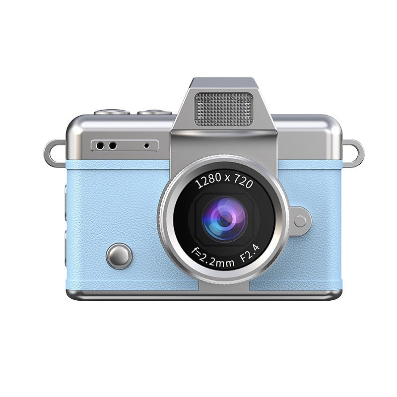 Close-up of Blue mini digital camera displaying