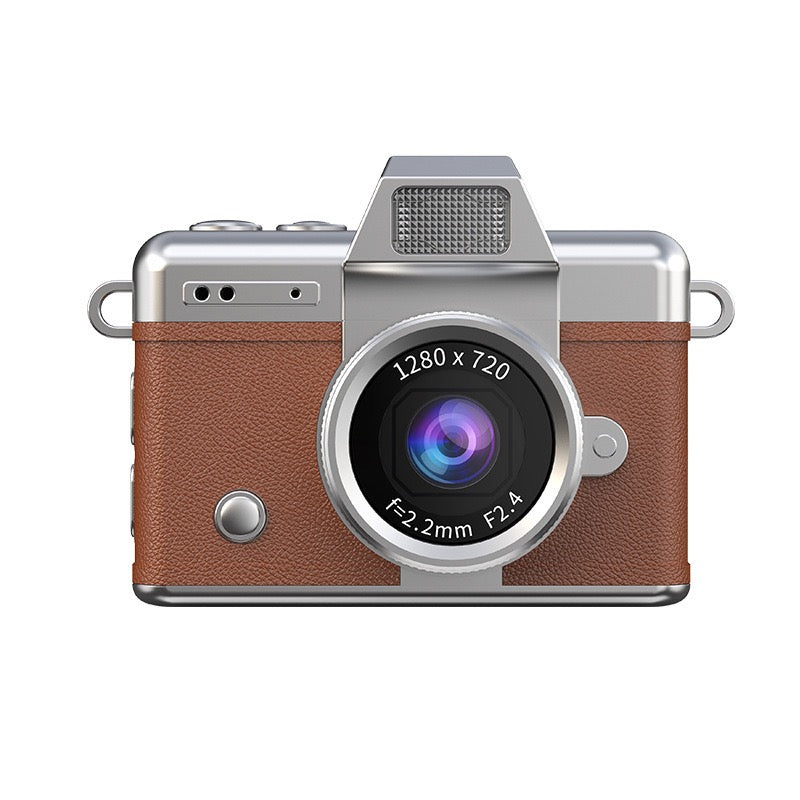Close-up of Brown mini digital camera displaying