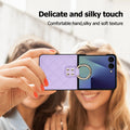 Close-up of Samsung Galaxy Z Flip 8 quilted leather case in Purple with gold ring kickstand demonstrating single-hand grip and 180° folding design.
