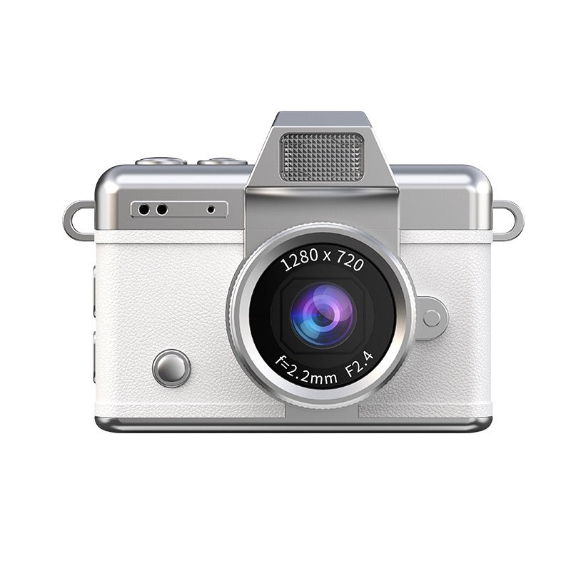 Close-up of White mini digital camera displaying