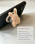 Hand holding a black smartphone with the soft pastel acrylic bunny phone grip showing secure grip hold