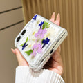 Side view of the clear iPhone DUO Garden Floral case, showing the bottom and corner bumpers.
