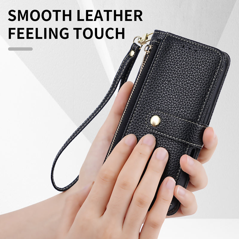 Close-up view of the smooth pebble-grained leather texture and durable stitching on the black wallet phone case.