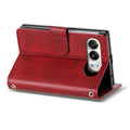 Dark red leather wallet case for iPhone DUO standing in horizontal kickstand mode highlighting rear camera lens cutout protection.