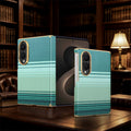 Emerald teal geometric pattern Samsung Galaxy Z Fold 8 case with gold camera frame and hinge cover standing on a table