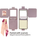 Flat lay view of Samsung Galaxy Z Flip leather case showing unfolded mirror compartment and floral scarf attachment