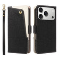 Front and back view of a closed black dual-tone pebbled leather wallet case for iPhone, showing the front diagonal cream contrast snap card pocket with gold button detail, back camera lens cutout.