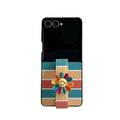 Front view studio shot of unfolded Samsung Z Flip rainbow stripe phone case with 3D smiley flower strap.