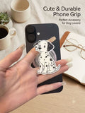Hand-drawn Dalmatian dog phone grip attached to a black phone held in hand.