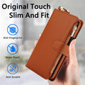 Hand holding a brown PU leather wallet phone case with snap-button flap, zippered pocket and gold-tone top ring.