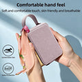 Hand holding a purple skin-friendly textured leather phone case with floral scarf accent