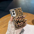 Hand holding Samsung Galaxy Z Fold case with flipped open vanity mirror for quick makeup touch-ups