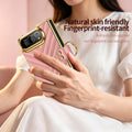 Hand holding pink quilted leather iPhone DUO case highlighting skin-friendly textured leather surface and fingerprint-resistant finish.