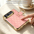 Hand touching soft diamond-quilted pink leather back panel on iPhone DUO case