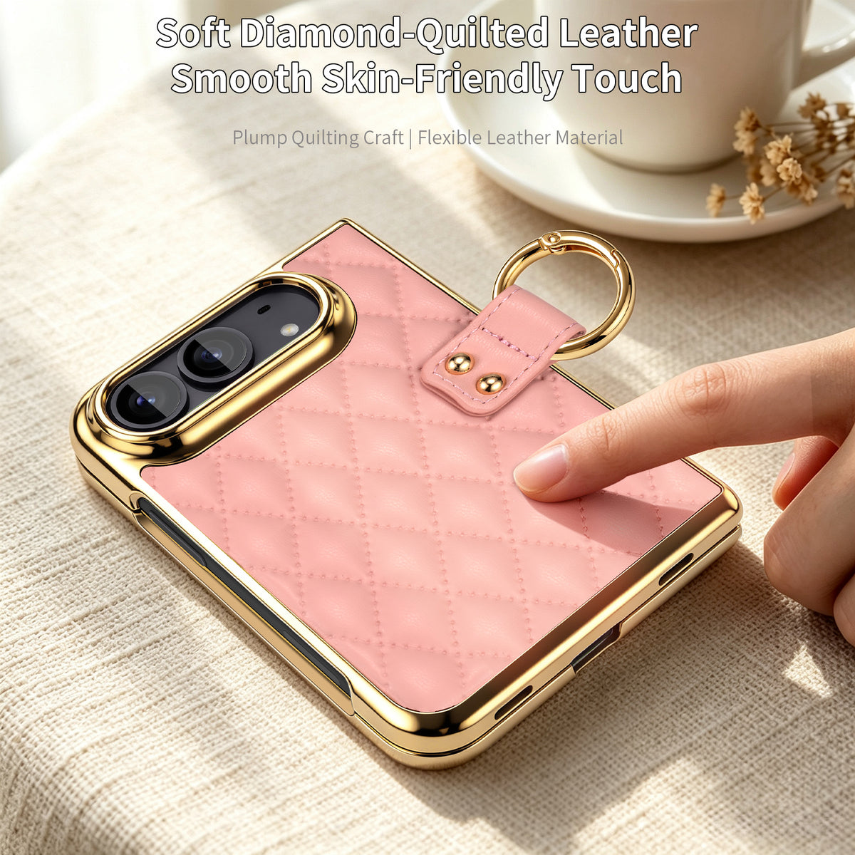 Hand touching soft diamond-quilted pink leather back panel on iPhone DUO case