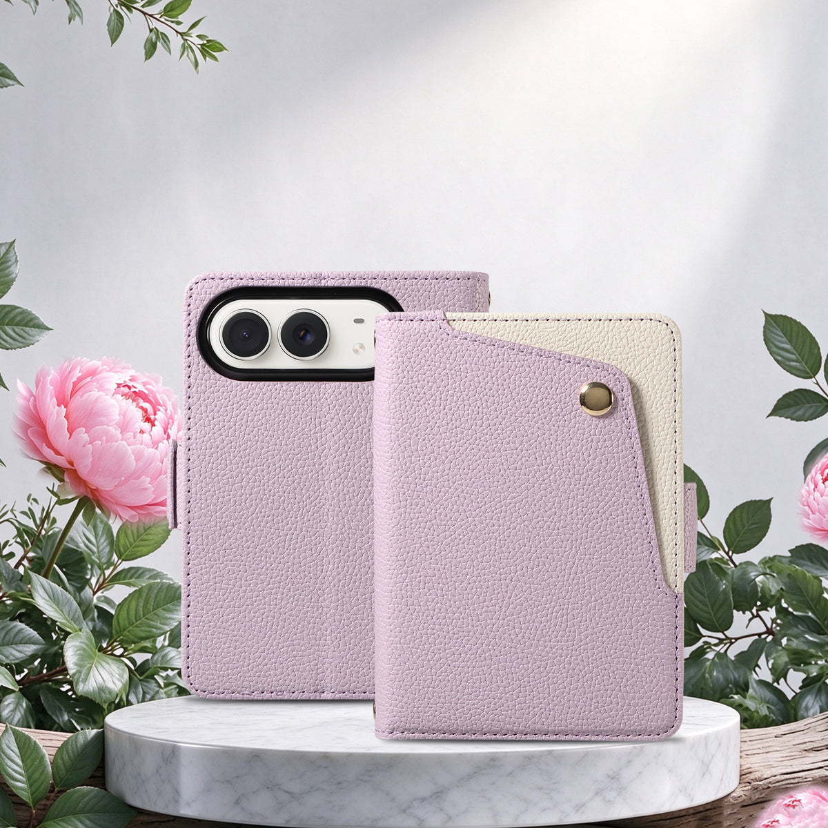 Lavender purple dual-tone leather wallet case for iPhone DUO displayed on a marble pedestal next to pink flowers.