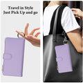 Light purple leather phone pouch clipped onto a tote bag using the metal ring attachment