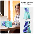 Mint green Samsung Z Flip phone case displayed in vertical and horizontal kickstand positions on a desk.⁠