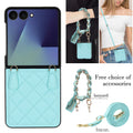 Mint green quilted leather Samsung Galaxy Z Flip case displayed with patterned teal scarf wristlet lanyard and long shoulder strap