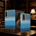 Ocean blue woven pattern Samsung Galaxy Z Fold 8 slim cover displayed open and folded on a classic dark wood desk