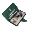 Open interior view of green leather wallet case with credit cards, cash, and Samsung Galaxy device inserted.