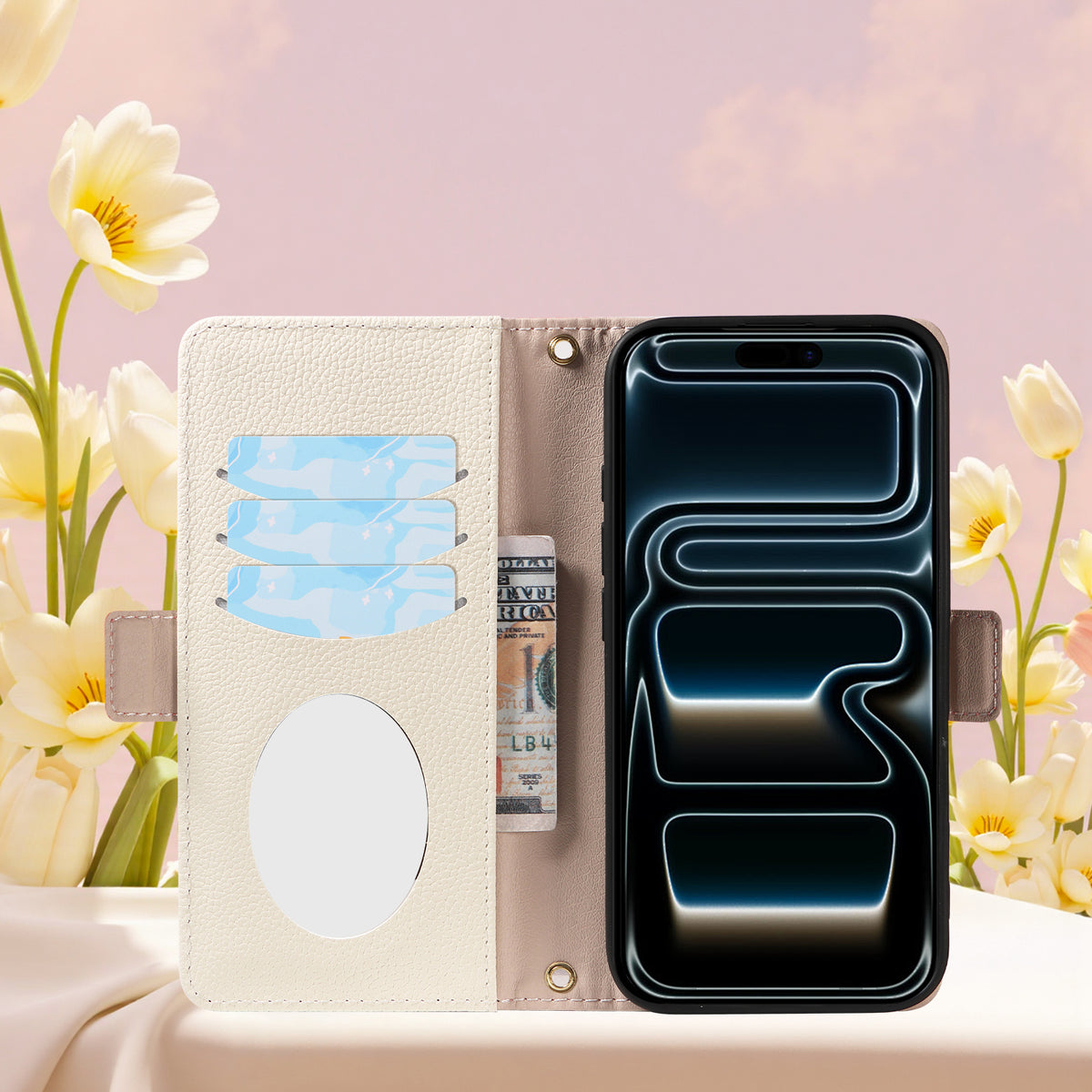 Open view of the cream interior of the dual-tone leather wallet case for iPhone, showing credit card slots, cash bill compartment, and integrated oval vanity mirror next to white flowers.