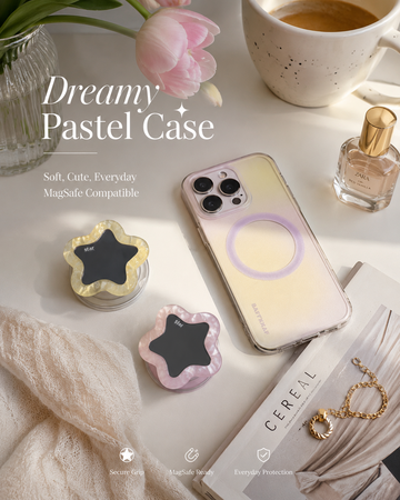 Pastel flower star mirror phone grip in pink and yellow displayed in aesthetic desk flatlay with MagSafe iPhone case, tulips, and coffee — cute Y2K phone accessory



