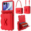 Red leather wallet case for Samsung Galaxy Z Flip showing bow accent, handbag and shoulder strap options, and opened accordion card holder