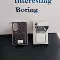Side-by-side comparison of black and white polka dot Samsung Z Fold 8 cases with one mirror closed and one mirror open.