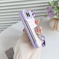 Side edge of the lavender polka dot case for iPhone DUO showing precise volume button alignment and smooth folding hinge bumper frame.