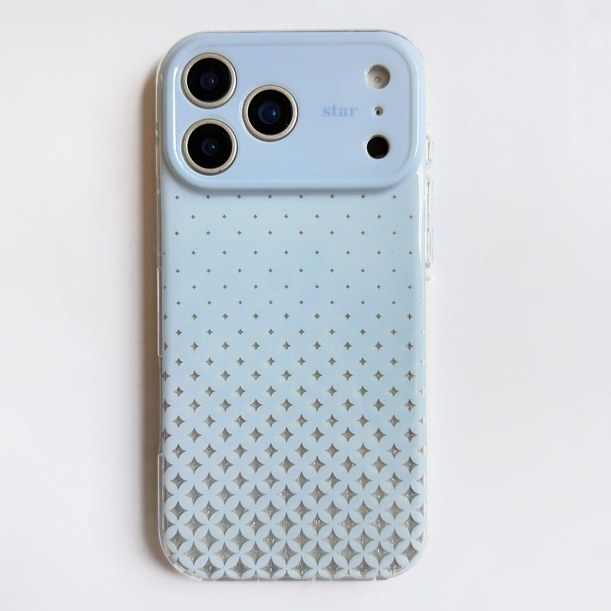 Sky Blue gradient star pattern iPhone case on dark background