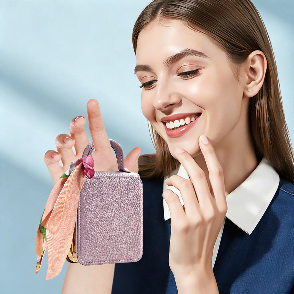 Smiling woman holding a purple handbag-style Samsung Galaxy Z Flip phone case by top handle