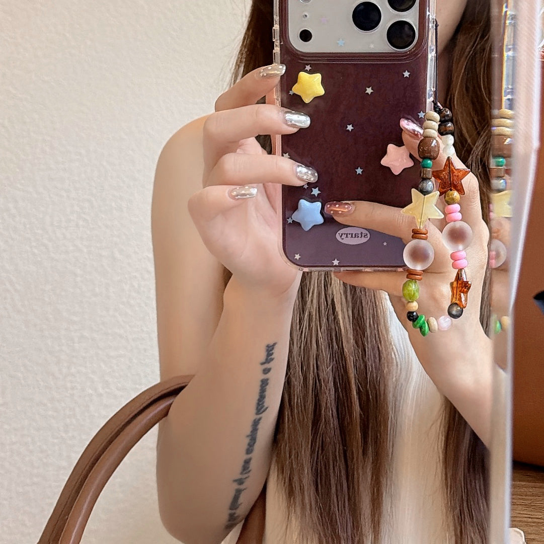 Starry iPhone case with colorful beaded charm strap – brown beige pink green beads with amber star accents – iPhone 17 16 15 case