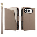 Taupe brown dual-tone leather wallet case for iPhone DUO showing the front snap button pocket, camera lens protection cutout, and matching wrist lanyard.