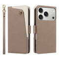 Taupe brown dual-tone leather wallet case for iPhone displaying the front cover with a brass snap button pocket, back camera lens cutout, and wristlet lanyard.
