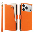 Vibrant orange dual-tone leather wallet case for iPhone displaying the front snap pocket, magnetic latch, camera cutout frame, and detachable matching wristlet strap.