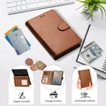 Vintage brown leather wallet case for iPhone DUO sitting on an office desk beside cash and credit cards, showcasing kickstand support, storage function, and comfortable material.