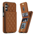 Vintage brown quilted leather wallet case for Samsung Galaxy A-Series displaying open snap-button wallet flap with multi-card slots and clear photo ID window.