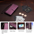 Violet purple Motorola Moto G Play leather wallet phone case displayed on a wooden surface with cash, credit cards, coins, wrist strap, zipper pocket, and kickstand details