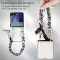 White quilted leather Samsung Galaxy Z Flip phone case with a black and white houndstooth scarf chain wristlet strap