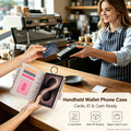Model wearing light purple leather Galaxy Z Fold 8 wallet case clipped by its top metal O-ring to a beige handbag shoulder strap for easy carry.