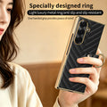 Woman holding black Samsung Galaxy Z Fold leather case securely with integrated gold ring holder