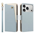 Light-blue pebbled leather smartphone wallet case. The front flap, with its diagonal blue and cream design and gold-tone stud button, is on the left next to a matching wrist strap.