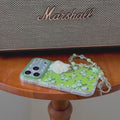 Video presenting the Floral iPhone case white flower prints with green leaves